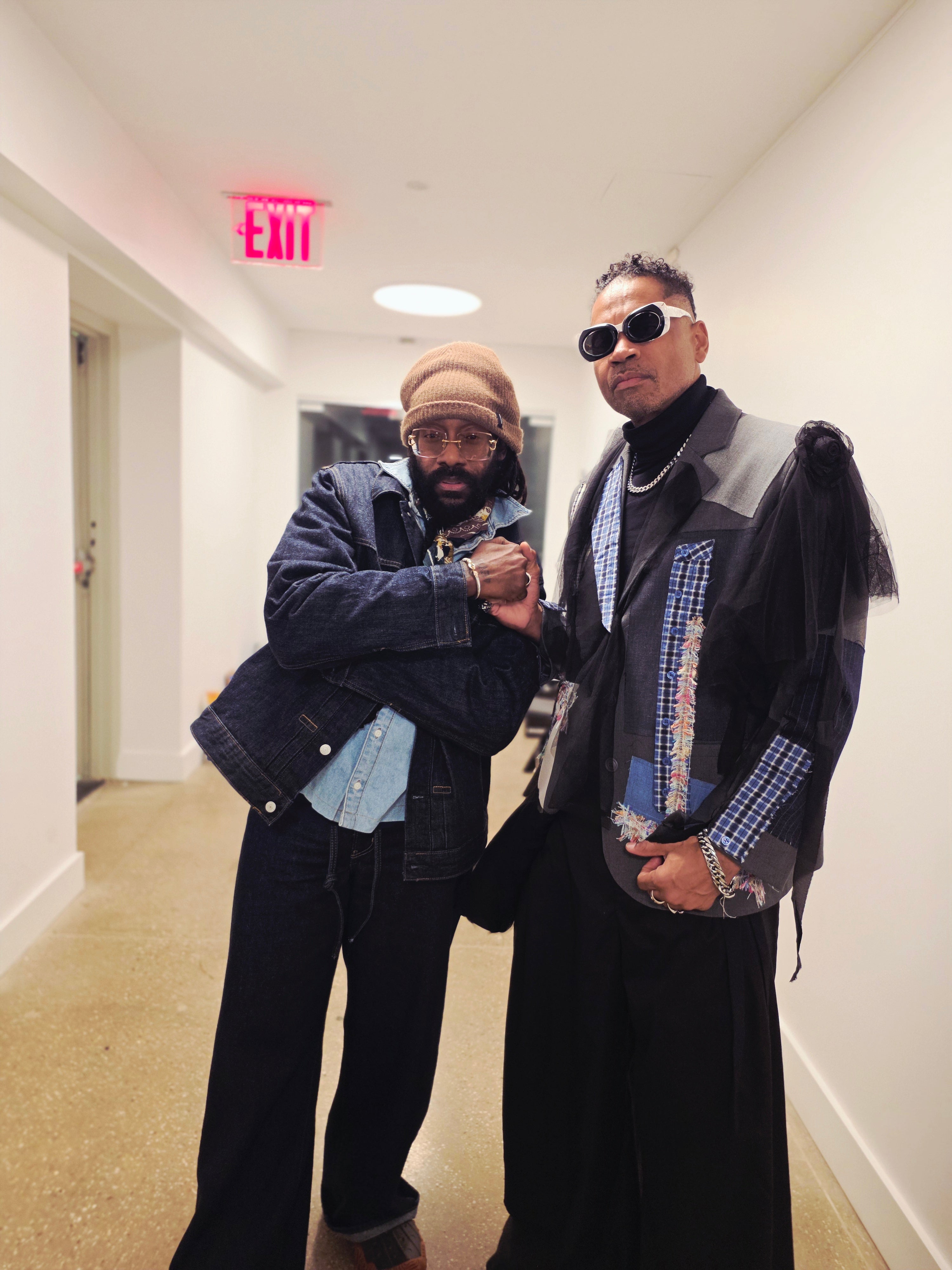Tarrus Riley with celebrity stylist Marcus Blessingame, owner of In Black Magazine, during a Verum Lumen Society Fashion Week access and industry visibility experience.